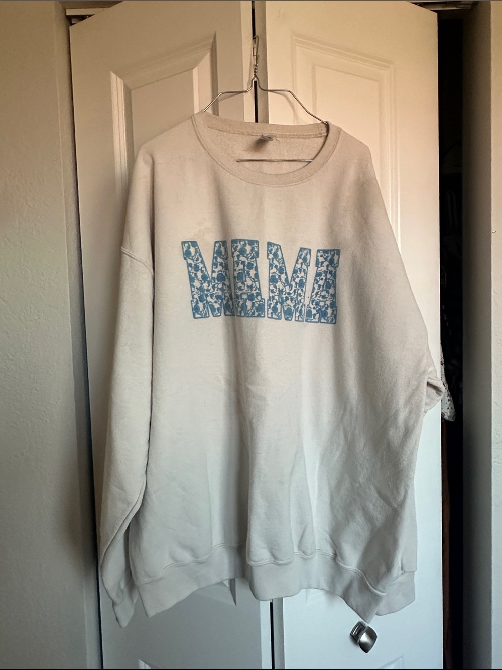 Women’s Cream Crewneck Sweatshirt with Blue Graphic